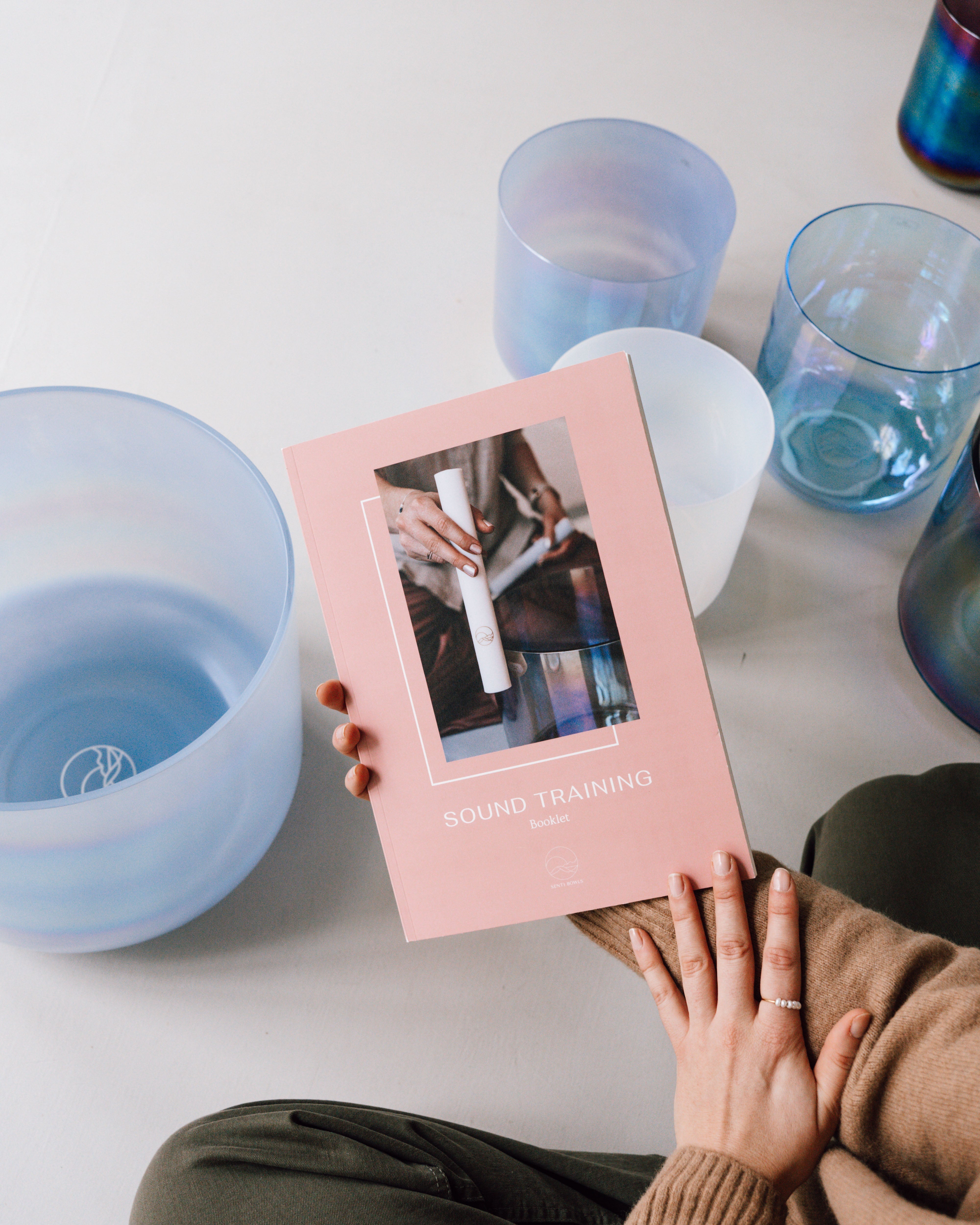 Unser tolles Trainingsbooklet, das wir dir zum Start des Trainings nach Hause schicken